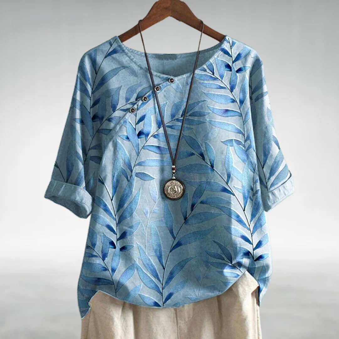 Capri - Women's Leaf-Print Blouse with Asymmetric Button Detail
