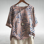Capri - Women's Leaf-Print Blouse with Asymmetric Button Detail