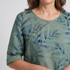 Capri - Women's Leaf-Print Blouse with Asymmetric Button Detail